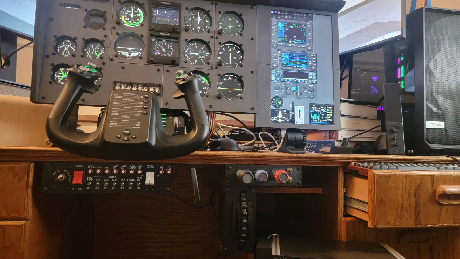 Overall simulator setup showing the current avionics stack and controls